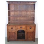 19th CENTURY WELSH OAK DOG KENNEL DRESSER having boarded three shelf rack back with original iron