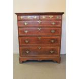18th CENTURY INLAID OAK CHEST OF TWO SHORT AND FOUR GRADUATED DRAWERS, having brass bat design,
