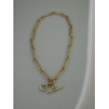 A LATE VICTORIAN 18CT GOLD FETTER LINK WATCH CHAIN WITH T BAR. Length 19" (48cm) Weight 101.4g