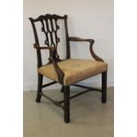 GEORGE III MAHOGANY ELBOW CHAIR, having arched and moulded rail above pierced Gothic and scroll