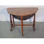 VICTORIAN WALNUT OVAL DROP LEAF SUTHERLAND TABLE, the leaves with shaped edges, on a baluster and