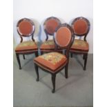 SET OF FOUR MAHOGANY VICTORIAN STYLE DINING CHAIRS having foliate moulding crestings to the oval