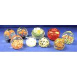 Collection of 9 assorted paperweights to include caned, fruit shaped, Caithness, ladybird,