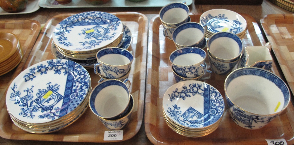 Two trays of Ridgways Staffordshire tea ware decorated on a white ground with swallows amongst