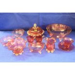 Quantity of assorted Cranberry glass to include fruit bowl, jar and cover, crimp edge bowl etc.