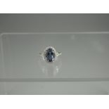 A 14ct WHITE GOLD TANZANITE AND DIAMOND