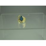 A 14ct GOLD AND TRIPLET OPAL DRESS RING