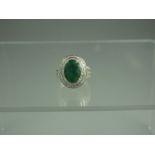 14ct GOLD EMERALD AND DIAMOND RING.  The