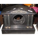 Late Victorian black slate architectural metal mounted clock case.