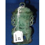 Chinese carved green hard stone solid urn with loop to domed top on elephant legs.  Probably jade.