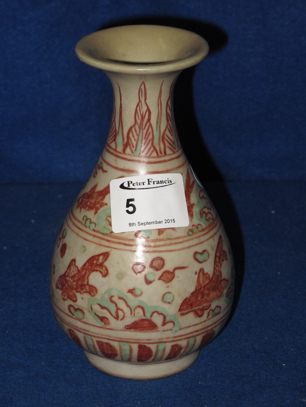 Small Chinese Stoneware pottery baluster shaped vase painted with bands of fish within