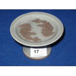Chinese Stoneware pedestal dish with applied relief decoration.  Unmarked. CONDITION REPORT: No