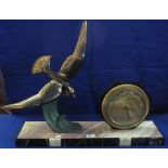 20th Century Art Deco design oxidised metal and marble sculptural clock with flying bird mount.