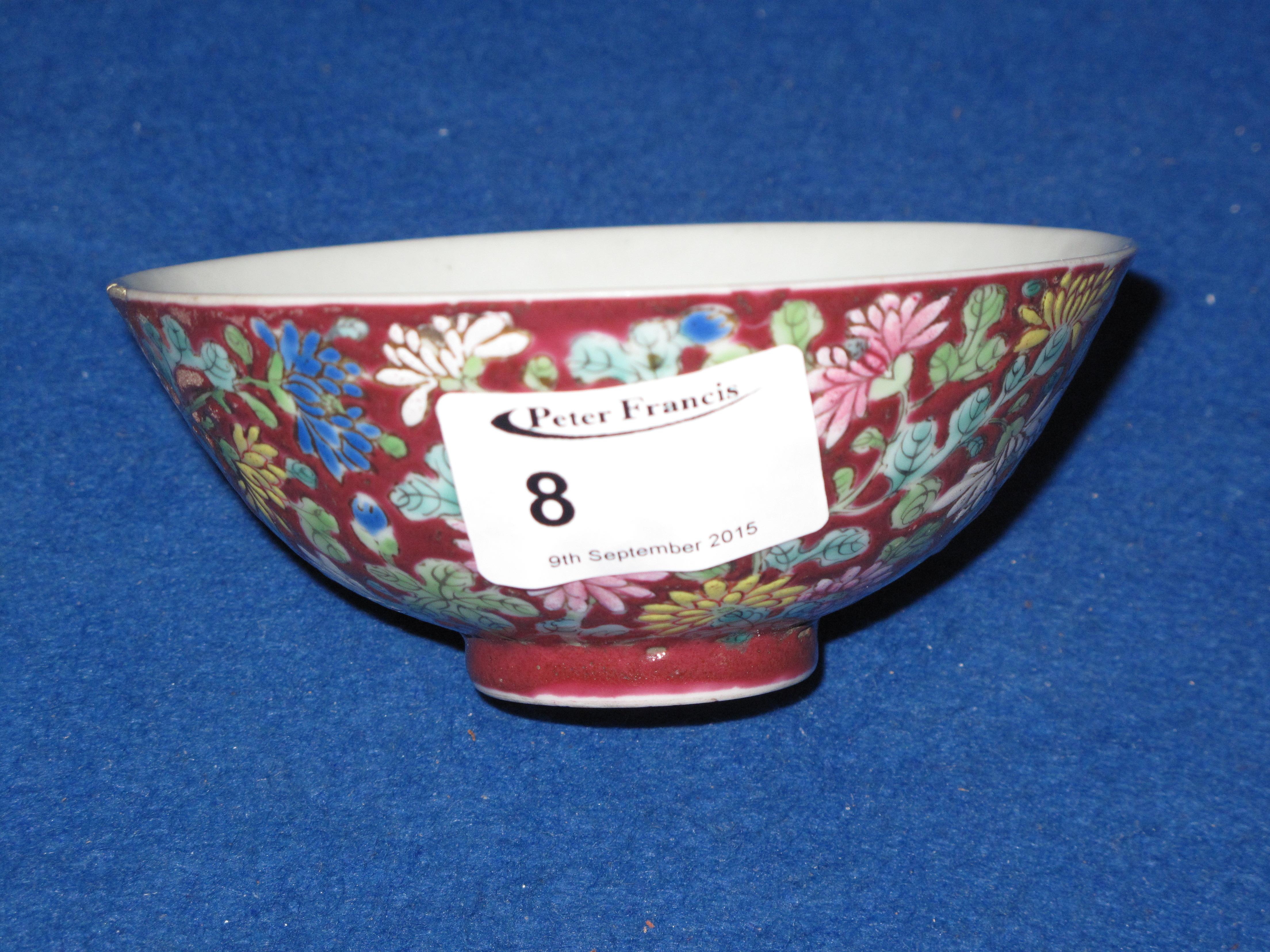 Small Chinese porcelain tea bowl overall decorated in coloured enamels with chrysanthemums and