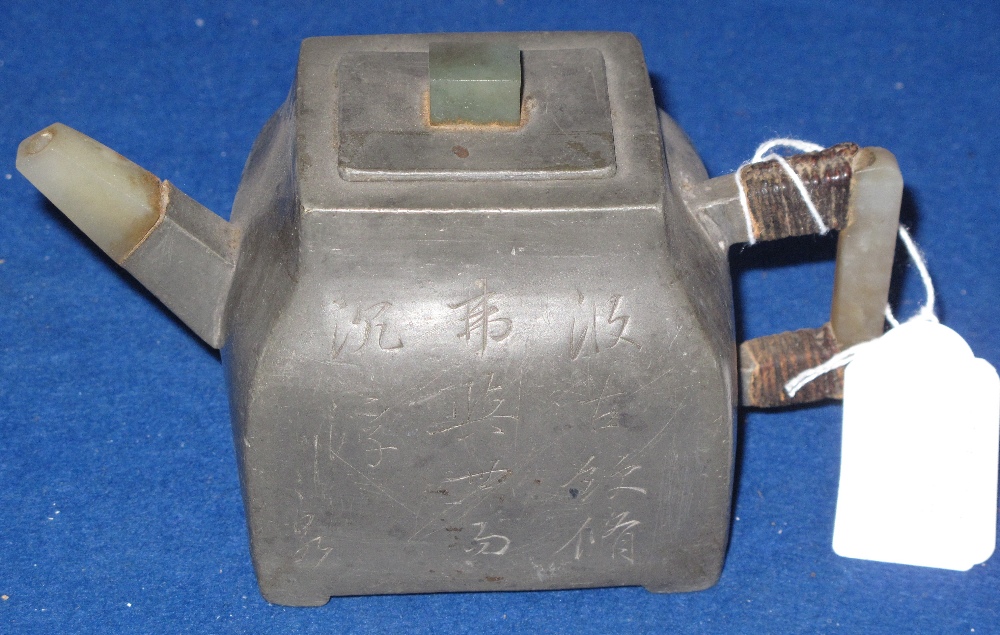 Small Chinese pewter teapot or rice wine pot with hard stone mounts and engraved script overall.