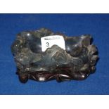 Chinese carved hard stone foliate decorated water trough decorated with relief flower heads and