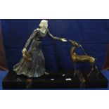 After G. Gori, Art Deco design figure group of a woman feeding a deer on heavy marble base.  Signed.