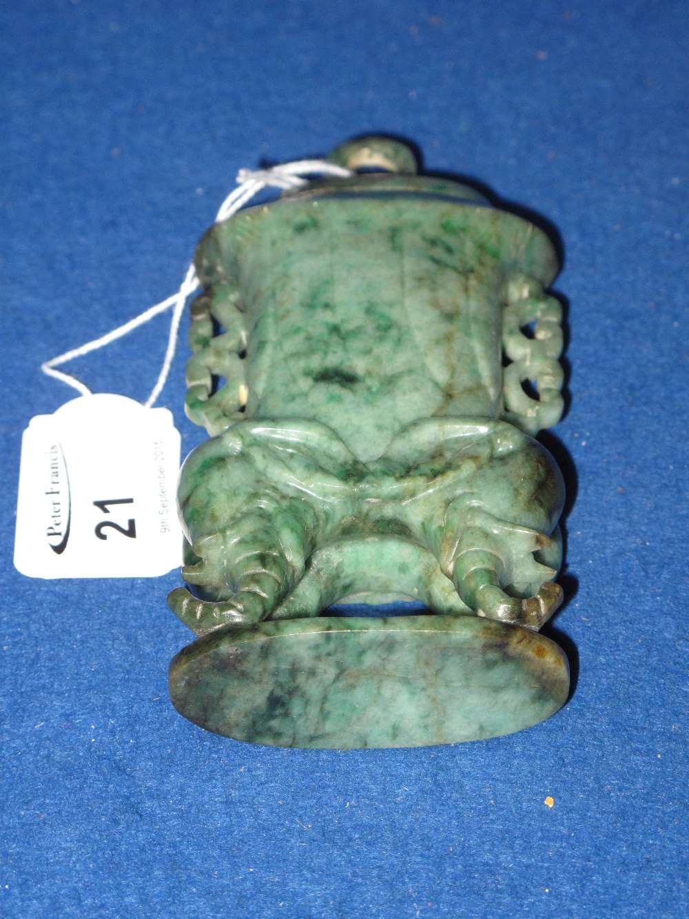 Chinese carved green hard stone solid urn with loop to domed top on elephant legs.  Probably jade. - Image 2 of 2