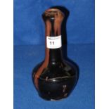 Chinese provincial Stoneware garlic bulb vase with overall brown and black streaked glazes.