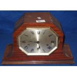 Mid 20th Century mahogany cased three train mantel clock with octagonal silvered face.