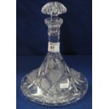 Engraved glass ship's type decanter with floral panels and mushroom stopper.