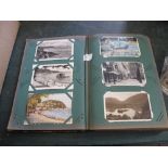 Postcards selection of topographical greetings & comic cards in large old album.