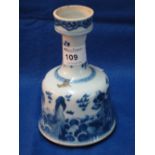 Chinese porcelain blue and white bell shaped vase on a white ground with scaly dragons amongst