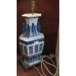 Chinese style blue and white porcelain vase shaped lamp base. CONDITION REPORT: Rather grubby but no