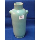 Chinese porcelain turquoise glazed cylinder vase with Dog of Fo mask and ring mounts. Unmarked.