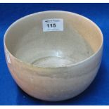 Chinese provincial stoneware deep bowl on a beige ground. Unmarked. Height 10cm, diameter