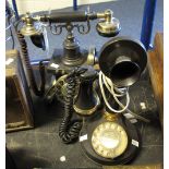 Plastic stick type reproduction telephone and another vintage design telephone.