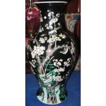 19th Century Chinese Famille Noire vase decorated with birds and cherry blossom in Kangxi style
