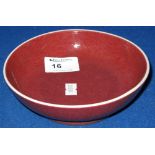 Chinese porcelain brush washer dish in overall copper red/Sang de boeuf glaze. 6" diameter.
***