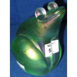 A "Glas form" green iridescent glass paper weight in the form of a seated frog.  Signed J.