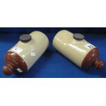 Pair of stone ware hot water bottles.