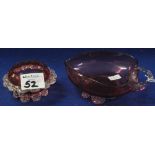 Cranberry glass heart shaped bowl with loop handle and a cranberry glass petalled salt. (2)