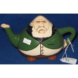 The Foly china 'Intarsio' baluster shaped character tea pot modelled as President Kruger.  Printed