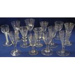 A group of 18th and 19th Century cut and etched glass liqueur or port glasses of various designs.