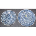 Two Chinese blue and white porcelain dishes, each overall decorated with flowers and foliage, and