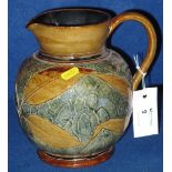 Doulton Lambeth stoneware pottery baluster shaped jug, relief decorated with leaves on a textured