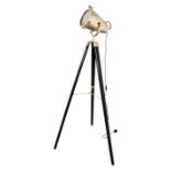 A Chrome and polished metal search light / theatre light on ebonised tripod wood base. Mid 20th