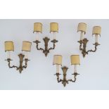 A set of four French style, exceptional quality, mid 20th century, gilt bronze two arm wall