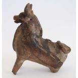 A South American Peruvian, Pre Columbian red ceramic bull vessel with splashes of glazing. L120mm,