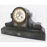 A French, late 19th Century slate mantel clock with eight day movement striking on a bell, the two