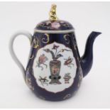 An English teapot, 'Ironstone China' probably by the Mortlock China Company. Blue underglaze with