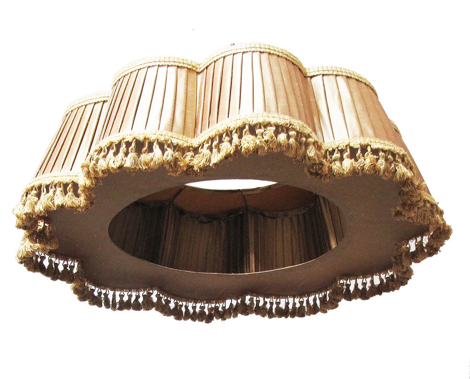 An unusual ten lobe pleated silk lamp shade with tassels for a hanging light. H22cm, W70cm.