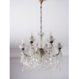 Georgian style six branch chandelier with facet cut crystal drops. The lamp shades are not included.