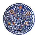 A large Turkish Iznik faience charger. W30cm.
No Reserve.
In-House Packing & Shipping Worldwide.