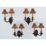 A set of four French style, exceptional quality, mid 20th century, patinated bronze two arm wall
