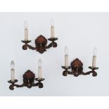 A set of three French style, mid 20th century, carved wood two arm wall lights, with bronze trays.